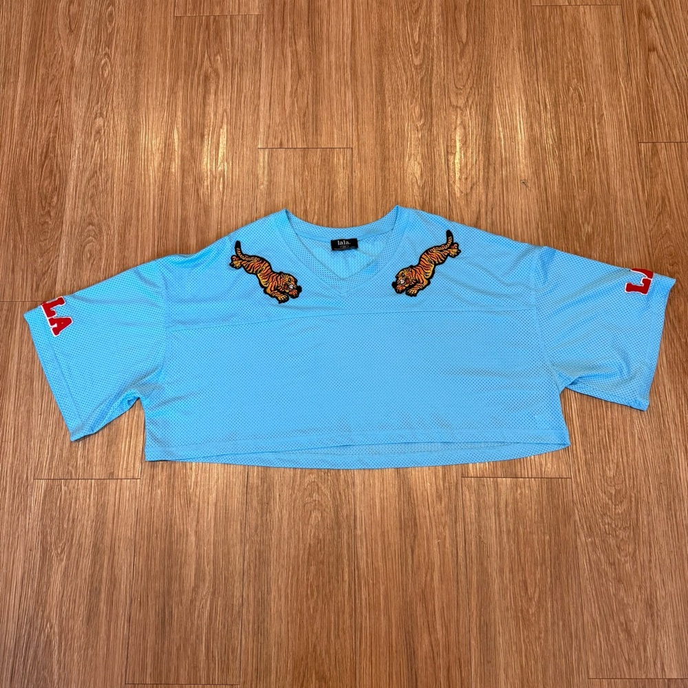 Dressed in LALA Light Blue Cropped Jersey with Tiger Patch